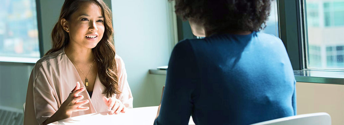 Two Women in a Meeting